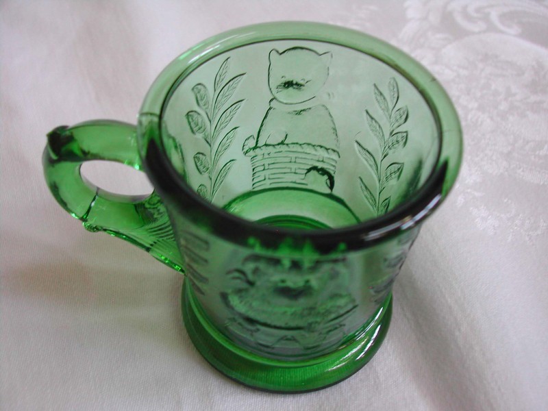A Green Pressed Glass Childrens Mug "Baby Animals" EAPG