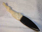 A Vintage Americana Beleen and Antler Nome Alaska Letter Opener