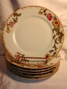 A lovely set of Antique Limoges Wild Flower Plates Jean Pouyat